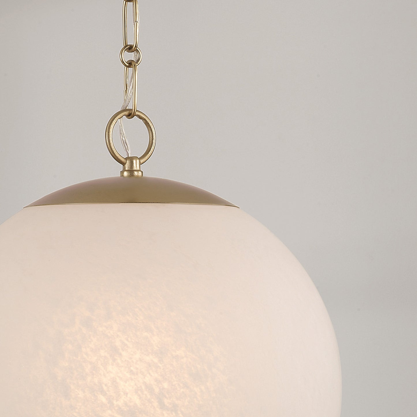 Cleo Globe Pendant in Matte Brass