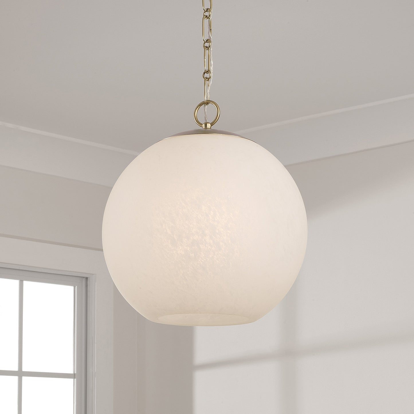 Cleo Globe Pendant in Matte Brass