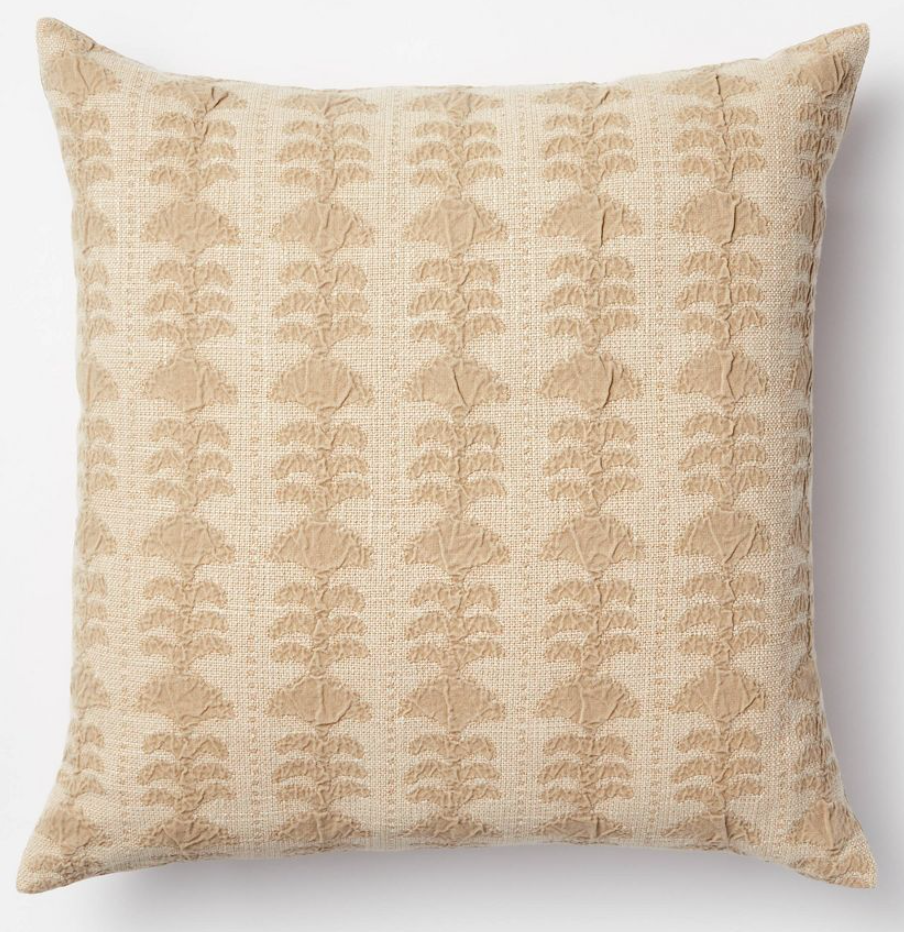 Monotone beige floral pillow