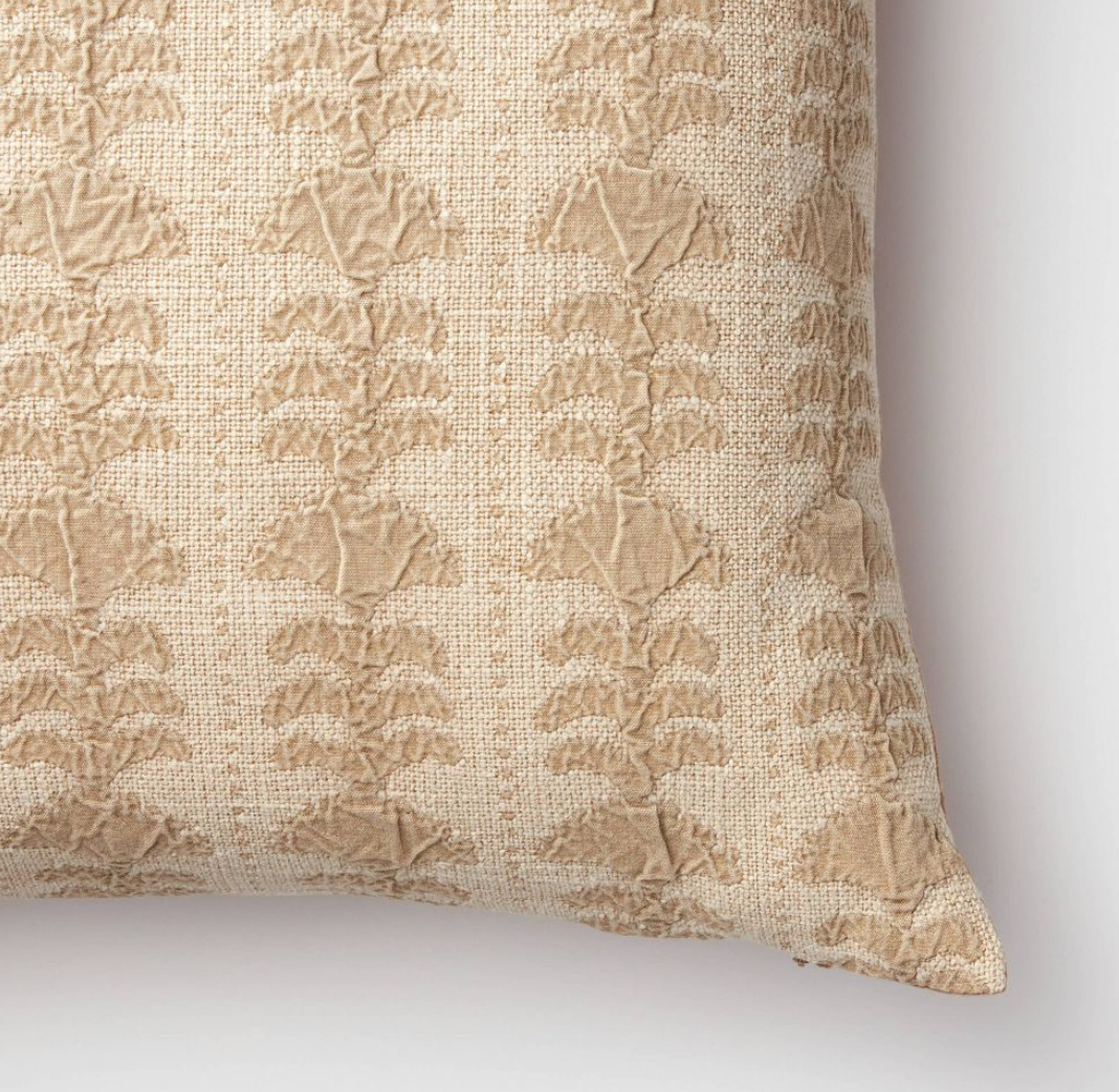 Monotone beige floral pillow